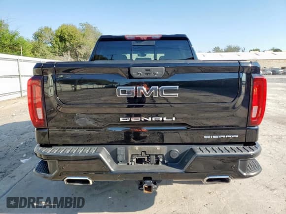 ✅ 2021 GMC Sierra 1500 Denali • VIN: 3GTU9FEL2MG304123 • Лот: 84589165. Опубликован ранее на Copart с пробегом 71 199 миль. Бесплатный доступ к архиву аукционных продаж из США и подробный отчёт об истории автомобиля на DreamBid. Изображение 6.