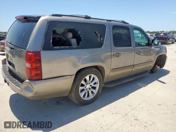 ✅ 2007 Chevrolet Suburban LTZ • VIN: 3GNFC16J37G299066 • Lot: 60494545. Listed on Copart with 131,022 mi. Free auction sales archive from the USA and detailed vehicle history report at DreamBid. Image 3.