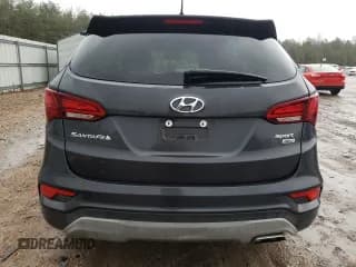 ✅ 2018 Hyundai Santa Fe 2.4L • VIN: 5XYZTDLBXJG562048 • Лот: 37648374. Опубликован ранее на Copart с пробегом 55 653 миль. Бесплатный доступ к архиву аукционных продаж из США и подробный отчёт об истории автомобиля на DreamBid. Изображение 6.