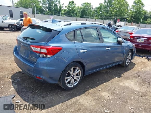 ✅ 2018 Subaru Impreza Limited • VIN: 4S3GTAU66J3724866 • Lot: 42542420. Listed on IAAI with 51,646 mi. Free auction sales archive from the USA and detailed vehicle history report at DreamBid. Image 4.