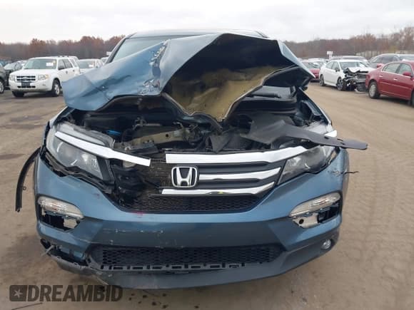 ✅ 2017 Honda Pilot EX-L • VIN: 5FNYF6H5XHB001772 • Lot: 43771030. Listed on IAAI with 126,659 mi. Free auction sales archive from the USA and detailed vehicle history report at DreamBid. Image 12.