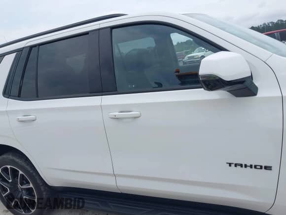 2023 Chevrolet Tahoe RST z VIN 1GNSKRKD7PR506168, wystawiony jako IAAI lot #42367788 z przebiegiem Nie podano mil oraz . Historia ofert i sprzedaży dostępna na DreamBid. Obrazek 13.