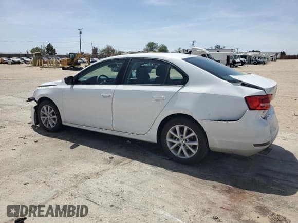 ✅ 2015 Volkswagen Jetta SE • VIN: 3VWD17AJ4FM338597 • Lot: 59349565. Listed on Copart with 50,108 mi. Free auction sales archive from the USA and detailed vehicle history report at DreamBid. Image 2.