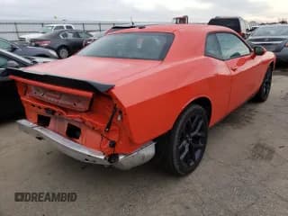 ✅ 2021 Dodge Challenger SXT • VIN: 2C3CDZAG2MH552672 • Lot: 37277363. Wystawiony na Copart z przebiegiem 10 669 mil. Bezpłatny archiwum sprzedaży aukcyjnych z USA i szczegółowy raport historii pojazdu na DreamBid. Zdjęcie 3.