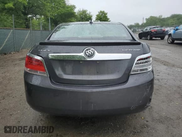 ✅ 2013 Buick LaCrosse Leather • VIN: 1G4GC5ERXDF155809 • Lot: 57708285. Wystawiony na Copart z przebiegiem 94 761 mil. Bezpłatny archiwum sprzedaży aukcyjnych z USA i szczegółowy raport historii pojazdu na DreamBid. Zdjęcie 6.