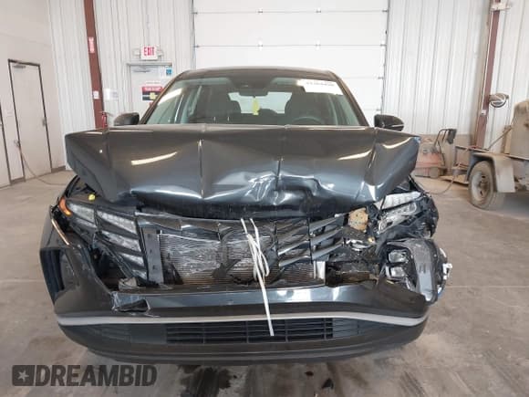 ✅ 2022 Hyundai Tucson SE • VIN: 5NMJACAE2NH079336 • Lot: 42364430. Wystawiony na IAAI z przebiegiem 23 981 mil. Bezpłatny archiwum sprzedaży aukcyjnych z USA i szczegółowy raport historii pojazdu na DreamBid. Zdjęcie 12.