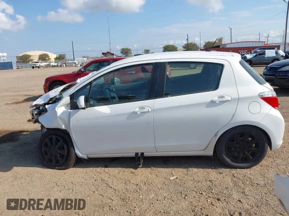 ✅ 2012 Toyota Yaris L • VIN: JTDKTUD36CD511723 • Lot: 43030009. Listed on IAAI with 199,329 mi. Free auction sales archive from the USA and detailed vehicle history report at DreamBid. Image 14.