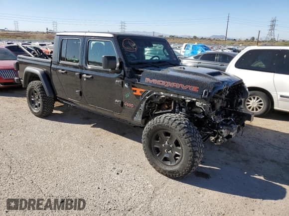 ✅ 2020 Jeep Gladiator Mojave • VIN: 1C6JJTEG1LL209606 • Lot: 88265265. Listed on Copart with 57,098 mi. Free auction sales archive from the USA and detailed vehicle history report at DreamBid. Image 4.