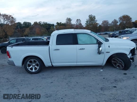 ✅ 2016 Ram 1500 Laramie • VIN: 1C6RR7NT9GS202740 • Lot: 43536595. Listed on IAAI with 117,564 mi. Free auction sales archive from the USA and detailed vehicle history report at DreamBid. Image 12.