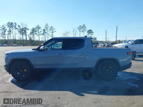 ✅ 2024 Rivian R1T Adventure • VIN: 7FCTGAAA5RN033799 • Лот: 41606562. Опубликован ранее на IAAI с пробегом 9 449 миль. Бесплатный доступ к архиву аукционных продаж из США и подробный отчёт об истории автомобиля на DreamBid. Изображение 14.