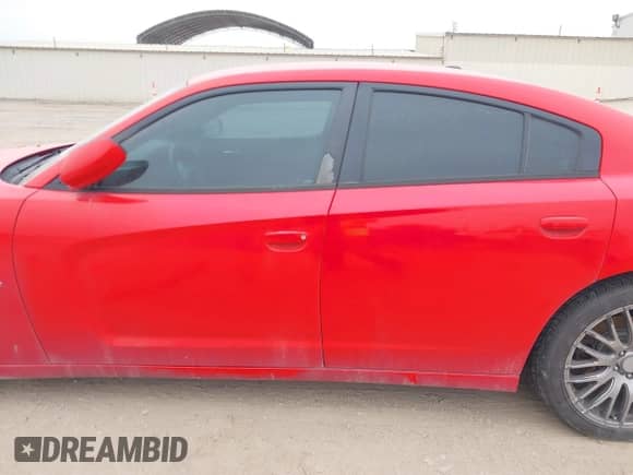 ✅ 2014 Dodge Charger RT • VIN: 2C3CDXCTXEH199291 • Lot: 41591362. Listed on IAAI with 113,452 mi. Free auction sales archive from the USA and detailed vehicle history report at DreamBid. Image 14.