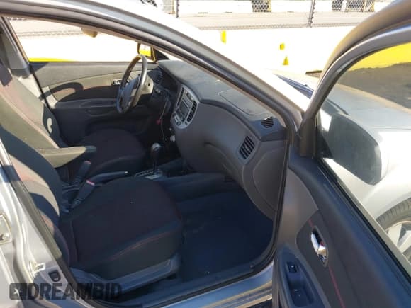 ✅ 2009 Kia Rio LX • VIN: KNADE243496483647 • Лот: 43476549. Опубликован ранее на IAAI с пробегом 104 001 миль. Бесплатный доступ к архиву аукционных продаж из США и подробный отчёт об истории автомобиля на DreamBid. Изображение 5.