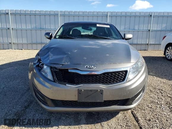 ✅ 2013 Kia Optima EX • VIN: 5XXGN4A71DG209884 • Lot: 92099775. Wystawiony na Copart z przebiegiem 169 018 mil. Bezpłatny archiwum sprzedaży aukcyjnych z USA i szczegółowy raport historii pojazdu na DreamBid. Zdjęcie 5.