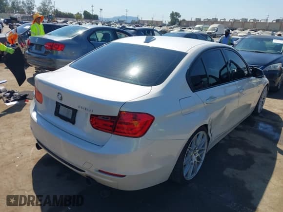 ✅ 2013 BMW 3 Series 335i • VIN: WBA3A9C56DF475075 • Lot: 43104849. Listed on IAAI with 141,148 mi. Free auction sales archive from the USA and detailed vehicle history report at DreamBid. Image 4.