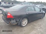 ✅ 2012 Ford Fusion Hybrid • VIN: 3FADP0L32CR157817 • Lot: 43842344. Listed on IAAI with 142,555 mi. Free auction sales archive from the USA and detailed vehicle history report at DreamBid. Image 4.