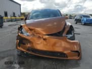 ✅ 2022 Tesla Model Y Performance • VIN: 7SAYGDEF4NF529899 • Lot: 89920025. Listed on Copart with 60,303 mi. Free auction sales archive from the USA and detailed vehicle history report at DreamBid. Image 5.