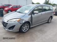 ✅ 2014 Mazda 5 Touring • VIN: JM1CW2CL7E0175902 • Lot: 43287647. Listed on IAAI with 98,037 mi. Free auction sales archive from the USA and detailed vehicle history report at DreamBid. Image 2.