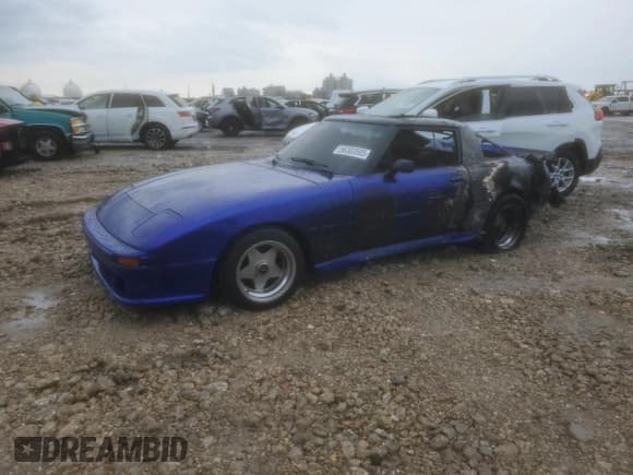 ✅ 1984 Mazda RX-7 • VIN: JM1FB3321E0839696 • Lot: 56303585. Wystawiony na Copart z przebiegiem Nie podano. Bezpłatny archiwum sprzedaży aukcyjnych z USA i szczegółowy raport historii pojazdu na DreamBid. Zdjęcie 1.