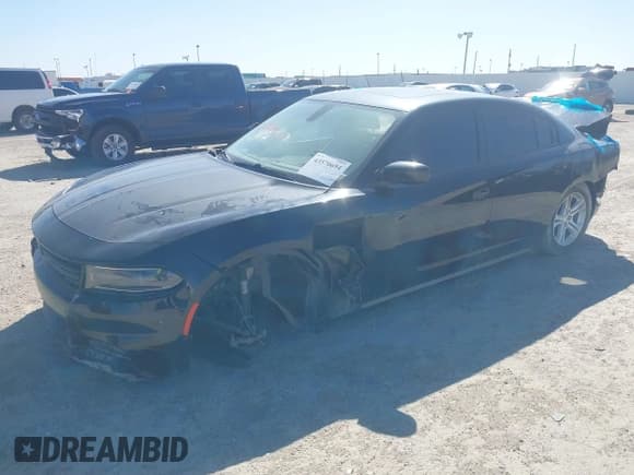 ✅ 2022 Dodge Charger SXT • VIN: 2C3CDXBG8NH197155 • Lot: 43593795. Listed on IAAI with 81,671 mi. Free auction sales archive from the USA and detailed vehicle history report at DreamBid. Image 2.