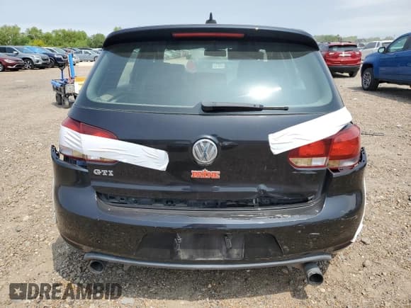 ✅ 2013 Volkswagen Golf GTI Driver's Edition • VIN: WVWHV7AJXDW139382 • Лот: 52128055. Опубликован ранее на Copart с пробегом 78 233 миль. Бесплатный доступ к архиву аукционных продаж из США и подробный отчёт об истории автомобиля на DreamBid. Изображение 6.