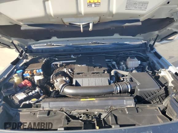 2022 Nissan Frontier Pro-X с VIN 1N6ED1EJ5NN633604, выставлен на аукционе Copart как лот 85081715 с пробегом 91 838 миль миль и Списание • Salvage title. История ставок и продаж доступна на DreamBid. Изображение 11.