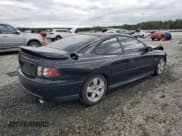 ✅ 2006 Pontiac GTO • VIN: 6G2VX12UX6L556239 • Lot: 84600425. Wystawiony na Copart z przebiegiem 148 064 mil. Bezpłatny archiwum sprzedaży aukcyjnych z USA i szczegółowy raport historii pojazdu na DreamBid. Zdjęcie 3.