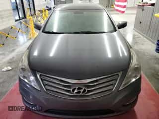 2013 Hyundai Azera z VIN KMHFH4JG8DA198246, wystawiony jako Copart lot #68794944 z przebiegiem 47 569 mil mil oraz Czysty tytuł • Clean title. Historia ofert i sprzedaży dostępna na DreamBid. Obrazek 5.