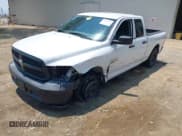 ✅ 2019 Ram 1500 Tradesman • VIN: 1C6RR6FG2KS719656 • Lot: 42737371. Listed on IAAI with 131,256 mi. Free auction sales archive from the USA and detailed vehicle history report at DreamBid. Image 17.