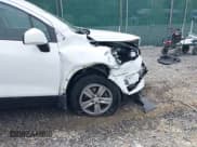 ✅ 2021 Chevrolet Trax LS • VIN: KL7CJNSB5MB326387 • Lot: 42402026. Listed on IAAI with 43,037 mi. Free auction sales archive from the USA and detailed vehicle history report at DreamBid. Image 18.