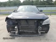 ✅ 2015 BMW 7 Series 750i • VIN: WBAYA8C51FG197764 • Lot: 67095554. Listed on Copart with 167,458 mi. Free auction sales archive from the USA and detailed vehicle history report at DreamBid. Image 5.