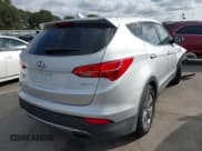 ✅ 2014 Hyundai Santa Fe • VIN: 5XYZT3LB1EG162718 • Лот: 43236826. Опубликован ранее на IAAI с пробегом 197 087 миль. Бесплатный доступ к архиву аукционных продаж из США и подробный отчёт об истории автомобиля на DreamBid. Изображение 4.