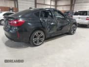 ✅ 2019 BMW X6 M • VIN: 5YMKW8C52KLR38376 • Lot: 41846130. Listed on IAAI with 52,844 mi. Free auction sales archive from the USA and detailed vehicle history report at DreamBid. Image 4.