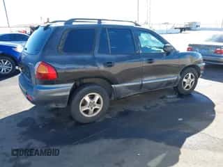 2004 Hyundai Santa Fe z VIN KM8SB12B44U711136, wystawiony jako IAAI lot #41551971 z przebiegiem 122 185 mil mil oraz . Historia ofert i sprzedaży dostępna na DreamBid. Obrazek 4.