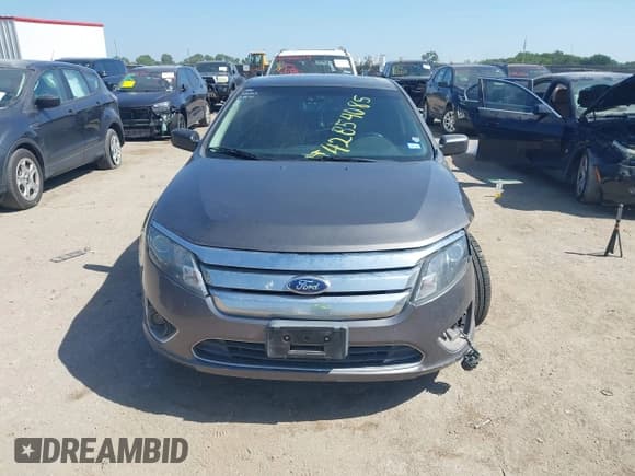 ✅ 2012 Ford Fusion Hybrid • VIN: 3FADP0L35CR241498 • Lot: 42854085. Listed on IAAI with 150,059 mi. Free auction sales archive from the USA and detailed vehicle history report at DreamBid. Image 12.