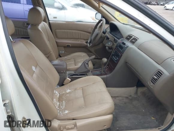 ✅ 1999 Nissan Maxima GXE • VIN: JN1CA21D7XT811913 • Lot: 42374679. Listed on IAAI with 209,172 mi. Free auction sales archive from the USA and detailed vehicle history report at DreamBid. Image 5.