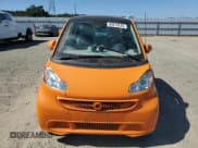 ✅ 2013 Smart fortwo Passion • VIN: WMEEJ9AA2DK673107 • Лот: 80876235. Опубликован ранее на Copart с пробегом Не указан. Бесплатный доступ к архиву аукционных продаж из США и подробный отчёт об истории автомобиля на DreamBid. Изображение 5.