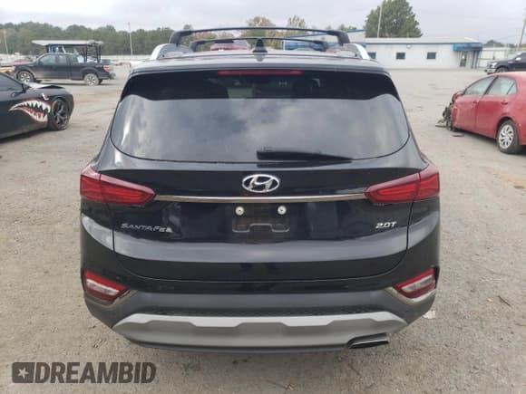 ✅ 2020 Hyundai Santa Fe Limited • VIN: 5NMS53AA7LH282936 • Lot: 77348253. Wystawiony na Copart z przebiegiem 31 129 mil. Bezpłatny archiwum sprzedaży aukcyjnych z USA i szczegółowy raport historii pojazdu na DreamBid. Zdjęcie 6.