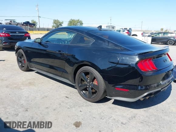 ✅ 2021 Ford Mustang GT • VIN: 1FA6P8CFXM5138390 • Lot: 42635895. Listed on IAAI with 59,184 mi. Free auction sales archive from the USA and detailed vehicle history report at DreamBid. Image 3.