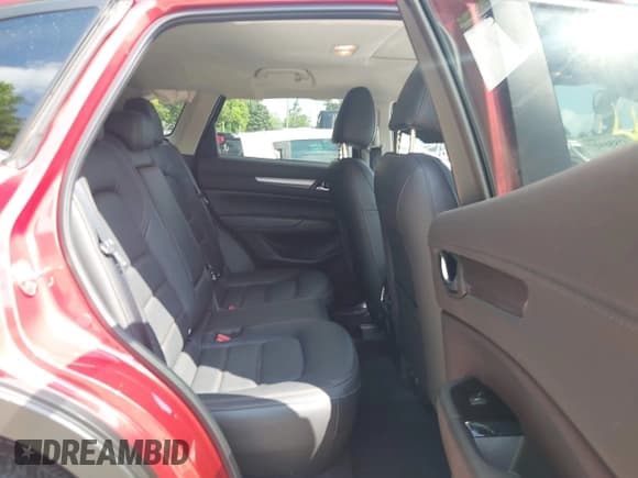 ✅ 2023 Mazda CX-5 S Carbon Edition • VIN: JM3KFBCM4P0239778 • Lot: 42856157. Listed on IAAI with 17,778 mi. Free auction sales archive from the USA and detailed vehicle history report at DreamBid. Image 8.