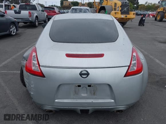 ✅ 2012 Nissan 370Z • VIN: JN1AZ4EH3CM562412 • Лот: 43400309. Опубликован ранее на IAAI с пробегом 91 464 миль. Бесплатный доступ к архиву аукционных продаж из США и подробный отчёт об истории автомобиля на DreamBid. Изображение 16.