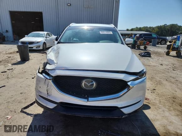 ✅ 2021 Mazda CX-5 Touring • VIN: JM3KFACM9M0418579 • Лот: 89574895. Опубликован ранее на Copart с пробегом 63 678 миль. Бесплатный доступ к архиву аукционных продаж из США и подробный отчёт об истории автомобиля на DreamBid. Изображение 5.