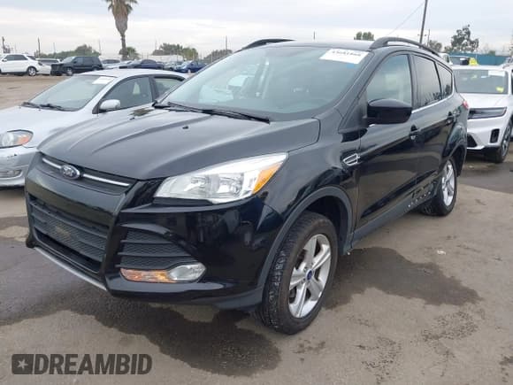 ✅ 2016 Ford Escape SE • VIN: 1FMCU0GX8GUA65763 • Lot: 43681868. Listed on IAAI with 95,273 mi. Free auction sales archive from the USA and detailed vehicle history report at DreamBid. Image 2.
