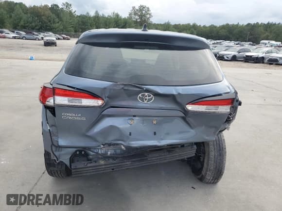 ✅ 2023 Toyota Corolla Cross L • VIN: 7MUAAAAG4PV052893 • Lot: 85883255. Wystawiony na Copart z przebiegiem 55 952 mil. Bezpłatny archiwum sprzedaży aukcyjnych z USA i szczegółowy raport historii pojazdu na DreamBid. Zdjęcie 6.