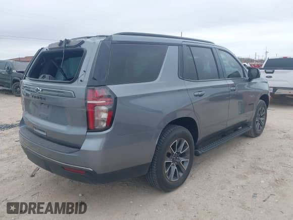 2022 Chevrolet Tahoe Z71 z VIN 1GNSKPKD3NR304672, wystawiony jako IAAI lot #41316391 z przebiegiem 70 380 mil mil oraz . Historia ofert i sprzedaży dostępna na DreamBid. Obrazek 4.