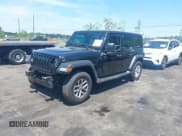 ✅ 2023 Jeep Wrangler Sport S • VIN: 1C4HJXDN5PW671167 • Lot: 42176127. Wystawiony na IAAI z przebiegiem 1 230 mil. Bezpłatny archiwum sprzedaży aukcyjnych z USA i szczegółowy raport historii pojazdu na DreamBid. Zdjęcie 18.