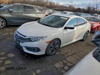 ✅ 2017 Honda Civic EX-L • VIN: 19XFC1F79HE214032 • Lot: 94431105. Listed on Copart with 147,619 mi. Free auction sales archive from the USA and detailed vehicle history report at DreamBid. Image 1.