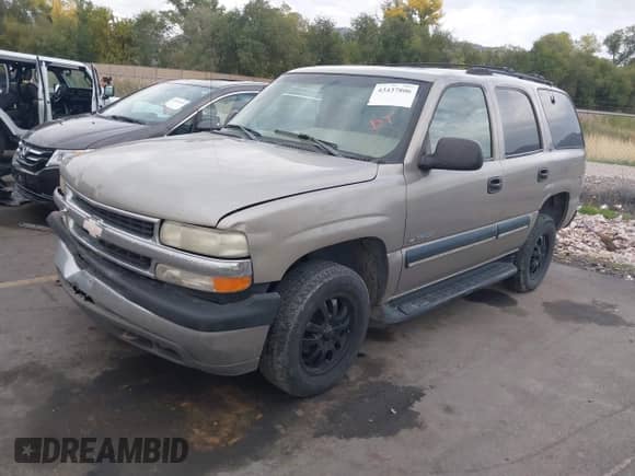 2001 Chevrolet Tahoe LT with VIN 1GNEK13T71J239513, listed as a IAAI auction lot 43437806 with 216,160 mi miles and . Bid and sale history available at DreamBid. Image 2.