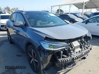 ✅ 2023 Volkswagen ID.4 Pro S • VIN: 1V2FMPE83PC012768 • Lot: 43323550. Listed on IAAI with 53,308 mi. Free auction sales archive from the USA and detailed vehicle history report at DreamBid. Image 1.