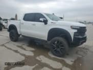 ✅ 2021 Chevrolet Silverado 1500 LT Trail Boss • VIN: 1GCPYFED4MZ171275 • Lot: 54148864. Wystawiony na Copart z przebiegiem 57 983 mil. Bezpłatny archiwum sprzedaży aukcyjnych z USA i szczegółowy raport historii pojazdu na DreamBid. Zdjęcie 4.