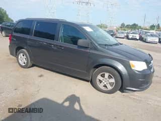2012 Dodge Grand Caravan SXT z VIN 2C4RDGCG5CR294986, wystawiony jako IAAI lot #42804374 z przebiegiem 183 596 mil mil oraz . Historia ofert i sprzedaży dostępna na DreamBid. Obrazek 1.